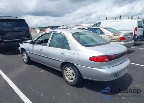 1999 Ford Escort Lx z USA, uszkodzony, nr VIN 1FAFP10P6XW164410